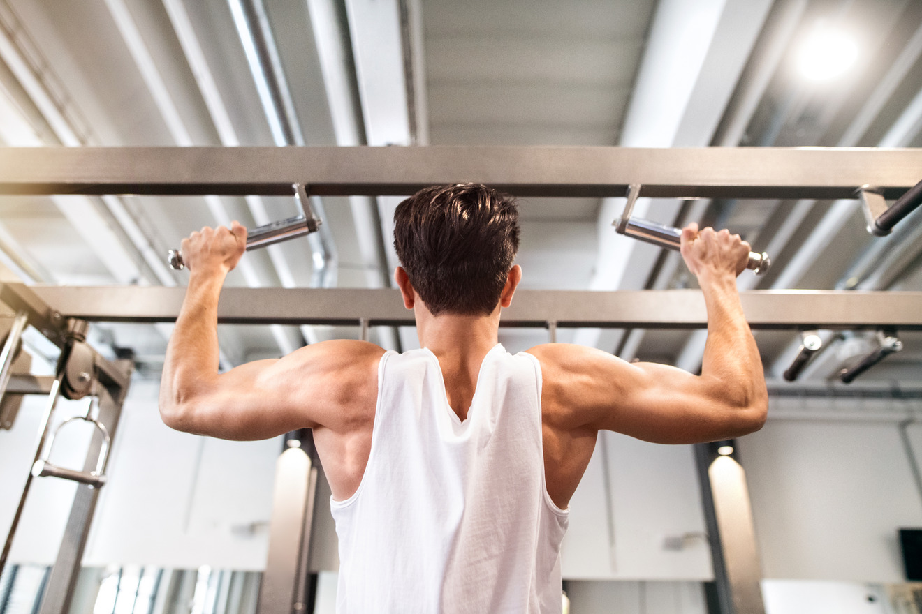 fitness enthusiast doing pull ups