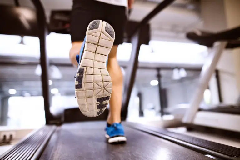 man running on treadmill