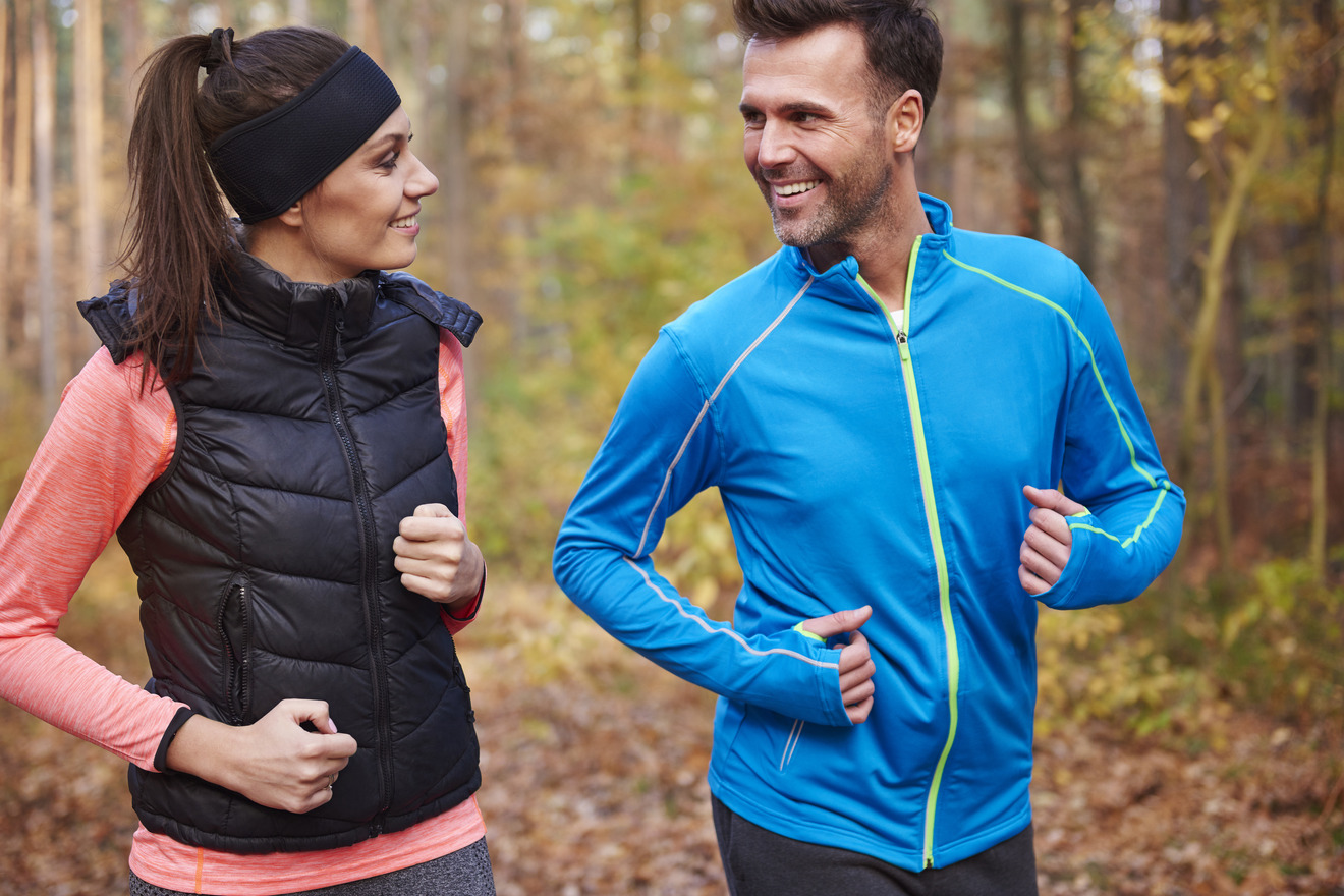 man and woman exercising together