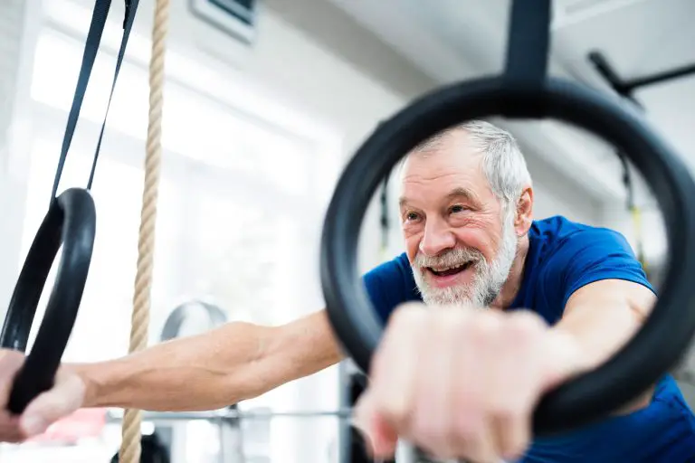 senior man working out in the gym